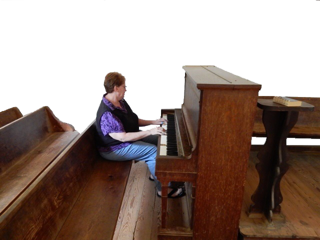 Reta playing the piano